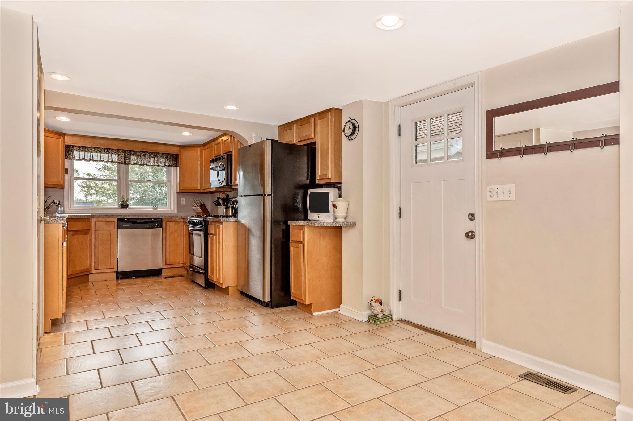 94 East Conestoga Road Devon, PA 19333 - Photo 10 of 34 Kitchen entry with kitchen to right