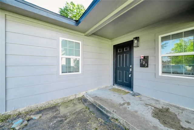 a view of a backyard of a house