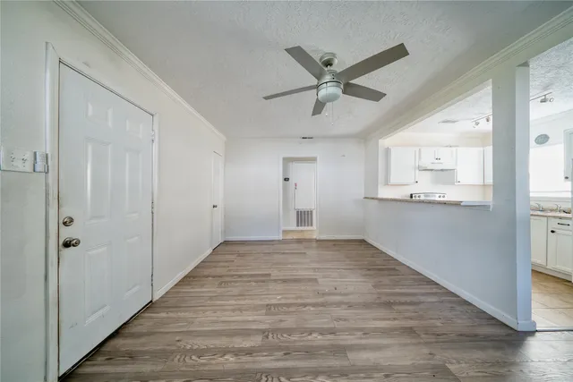 a view of an empty room and window