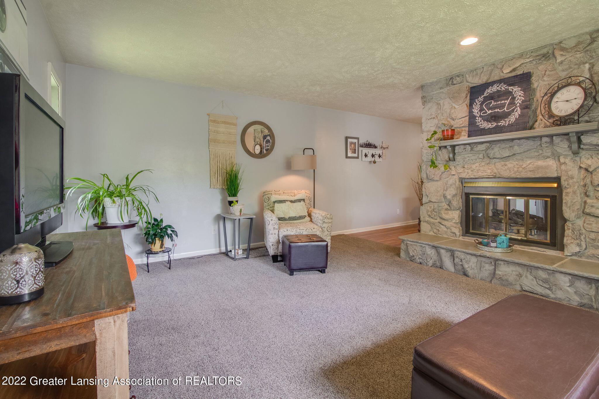 1208 Schavey Road Dewitt, MI 48820 - Photo 17 of 38 Living Room