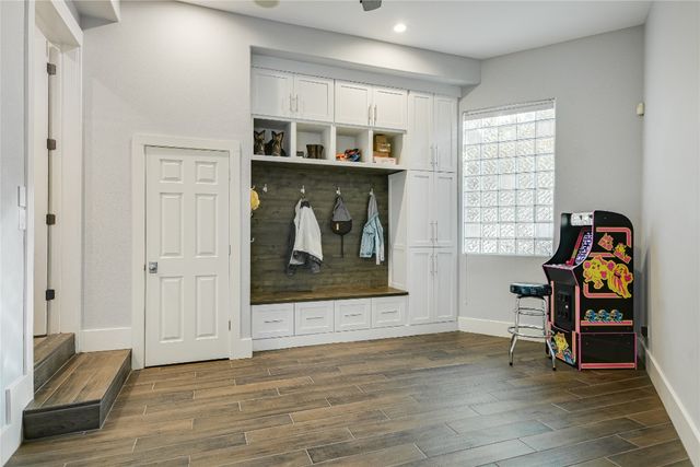 a outdoor living space with furniture and a fireplace