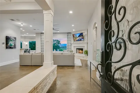 a kitchen with lots of counter top space sink and stainless steel appliances