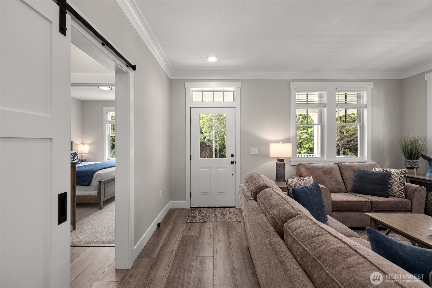 37 Elk Creek Road Raymond, WA 98577 - Photo 11 of 26 a living room with furniture and a large window