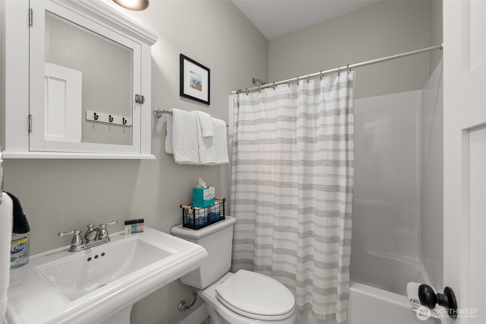 37 Elk Creek Road Raymond, WA 98577 - Photo 14 of 26 a bathroom with a sink toilet and shower