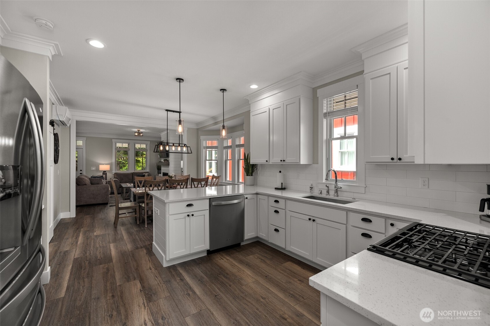 37 Elk Creek Road Raymond, WA 98577 - Photo 5 of 26 a kitchen with sink stove refrigerator and cabinets