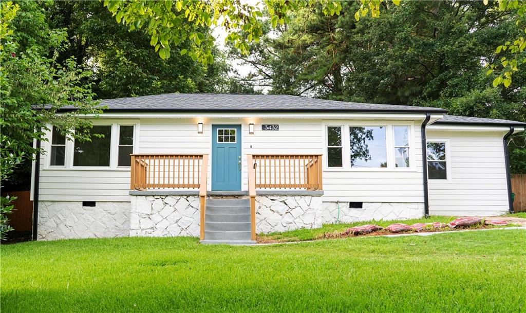 3432 Jackson Drive Decatur, GA 30032 - Photo 1 of 1 front view of a house with a yard