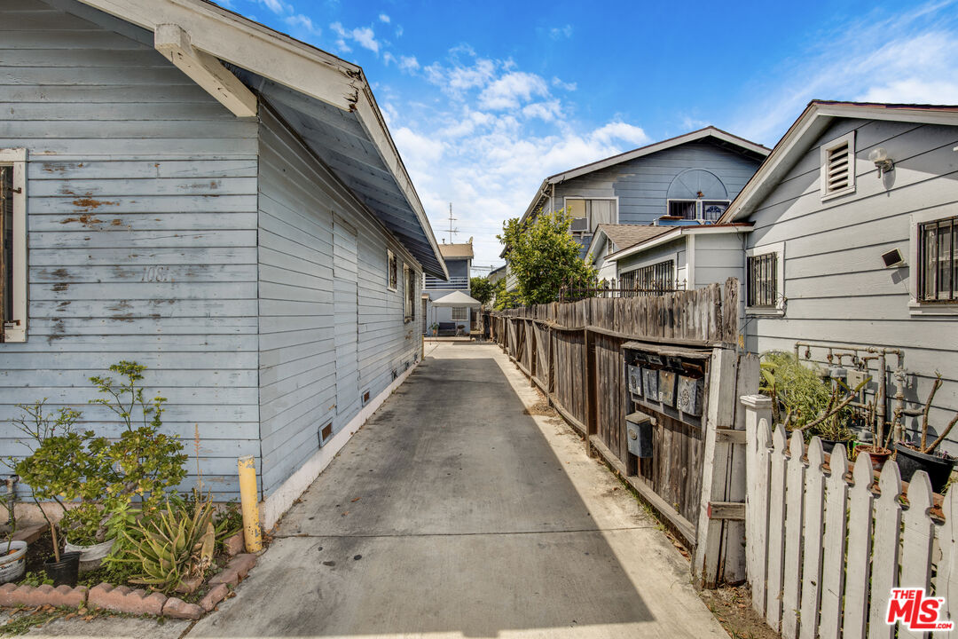 1081 Cherry Avenue Long Beach, CA 90813 - Photo 2 of 9 a view of a pathway with a house
