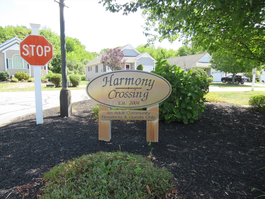 a view of a street with sign board