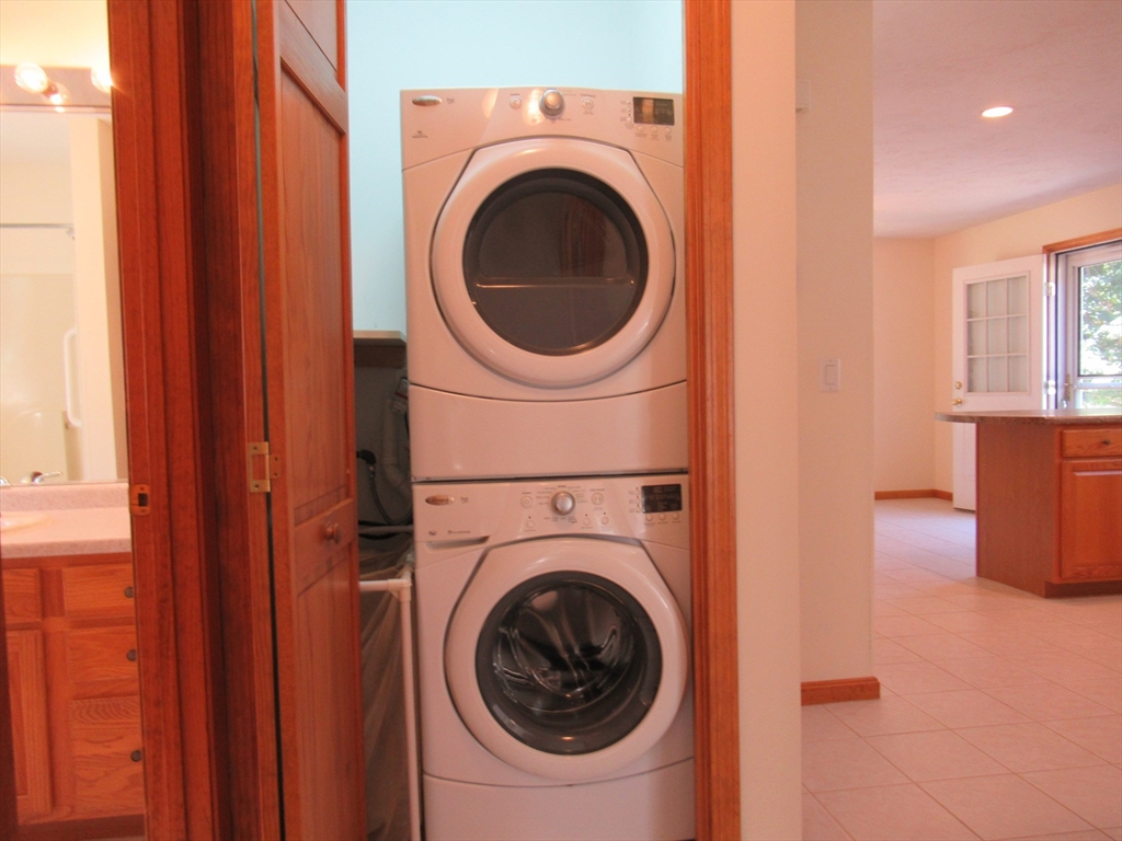 25 Rodeo Drive East Bridgewater, MA 02333 - Photo 11 of 17 a utility room with dryer and washer