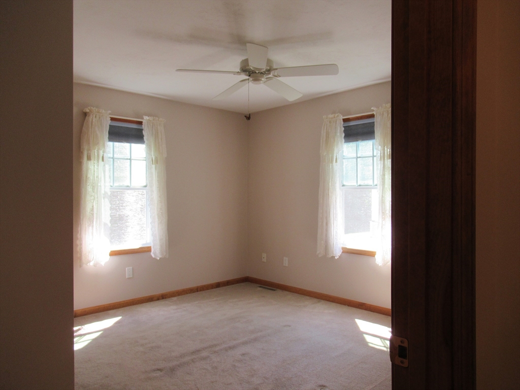 25 Rodeo Drive East Bridgewater, MA 02333 - Photo 9 of 17 an empty room that has a window