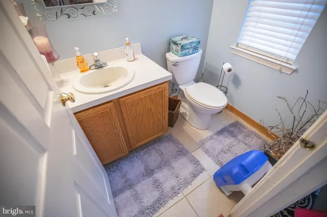 a bathroom with a sink and toilet