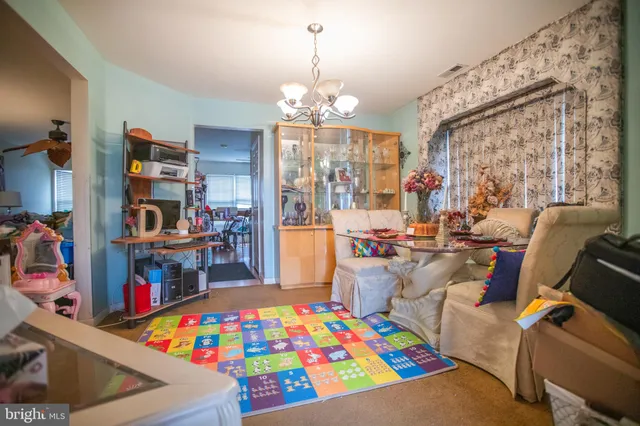 a very nice looking bedroom with many windows