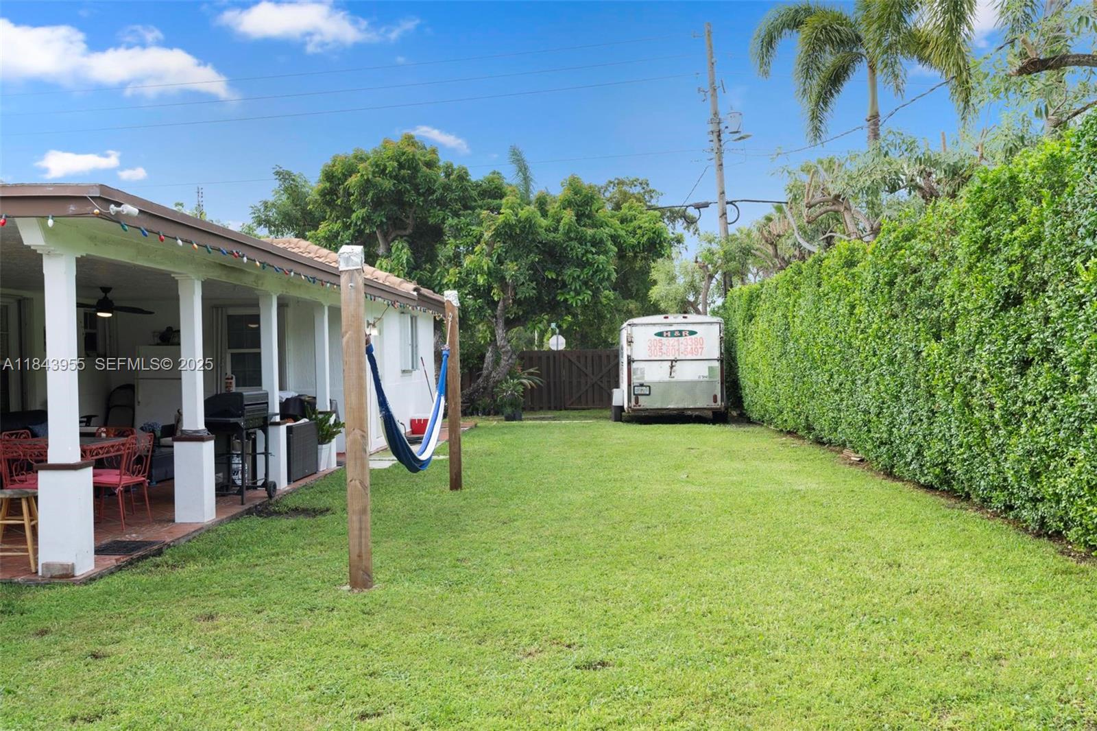 28401 Southwest 158th Court Homestead, FL 33033 - Photo 28 of 47 a view of a backyard with a garden and plants