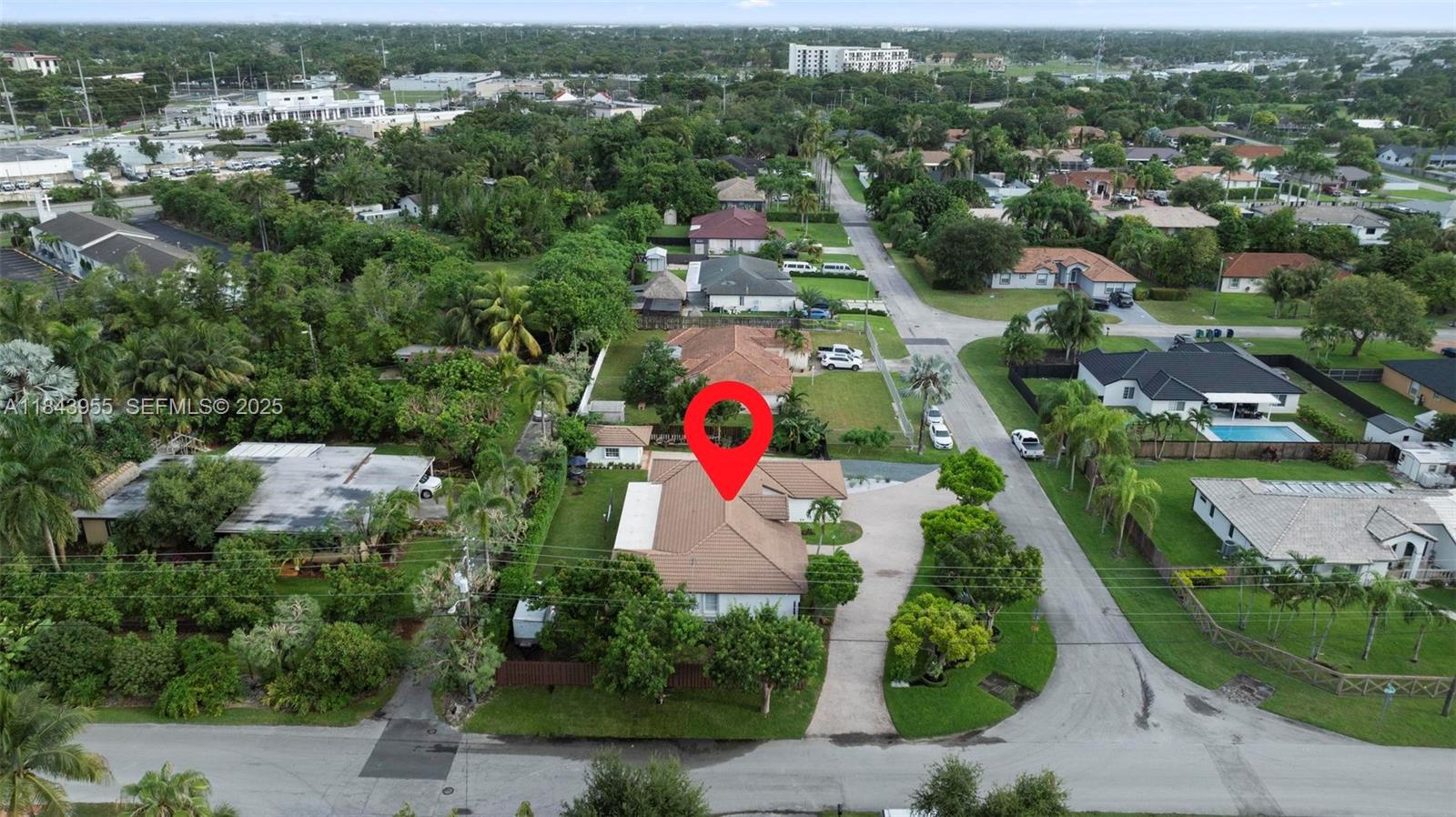 28401 Southwest 158th Court Homestead, FL 33033 - Photo 43 of 47 an aerial view of residential houses with outdoor space and trees
