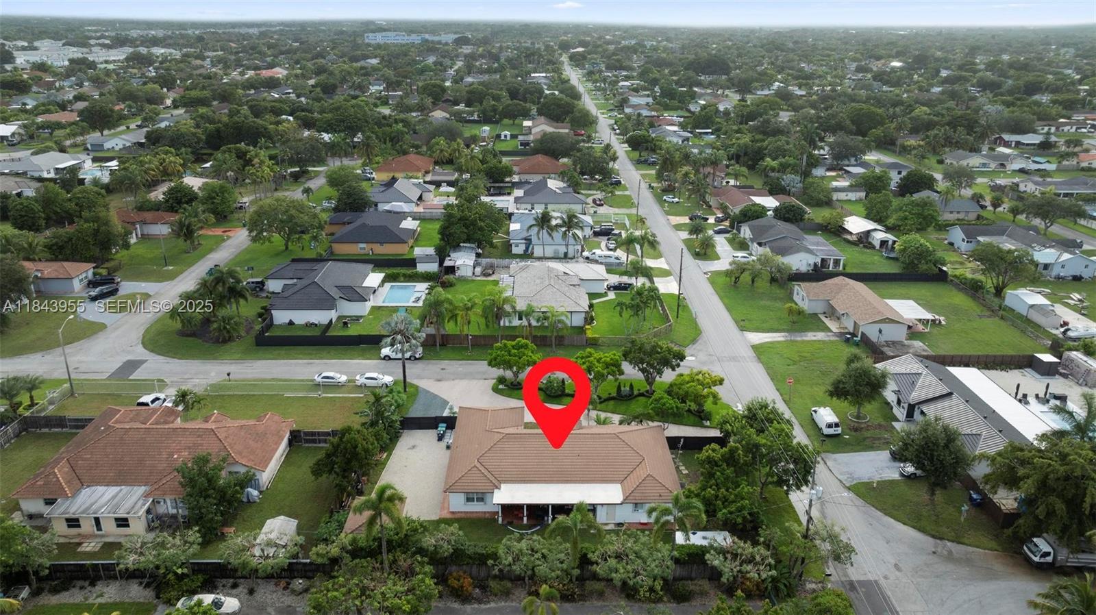 28401 Southwest 158th Court Homestead, FL 33033 - Photo 44 of 47 an aerial view of residential houses with outdoor space and trees