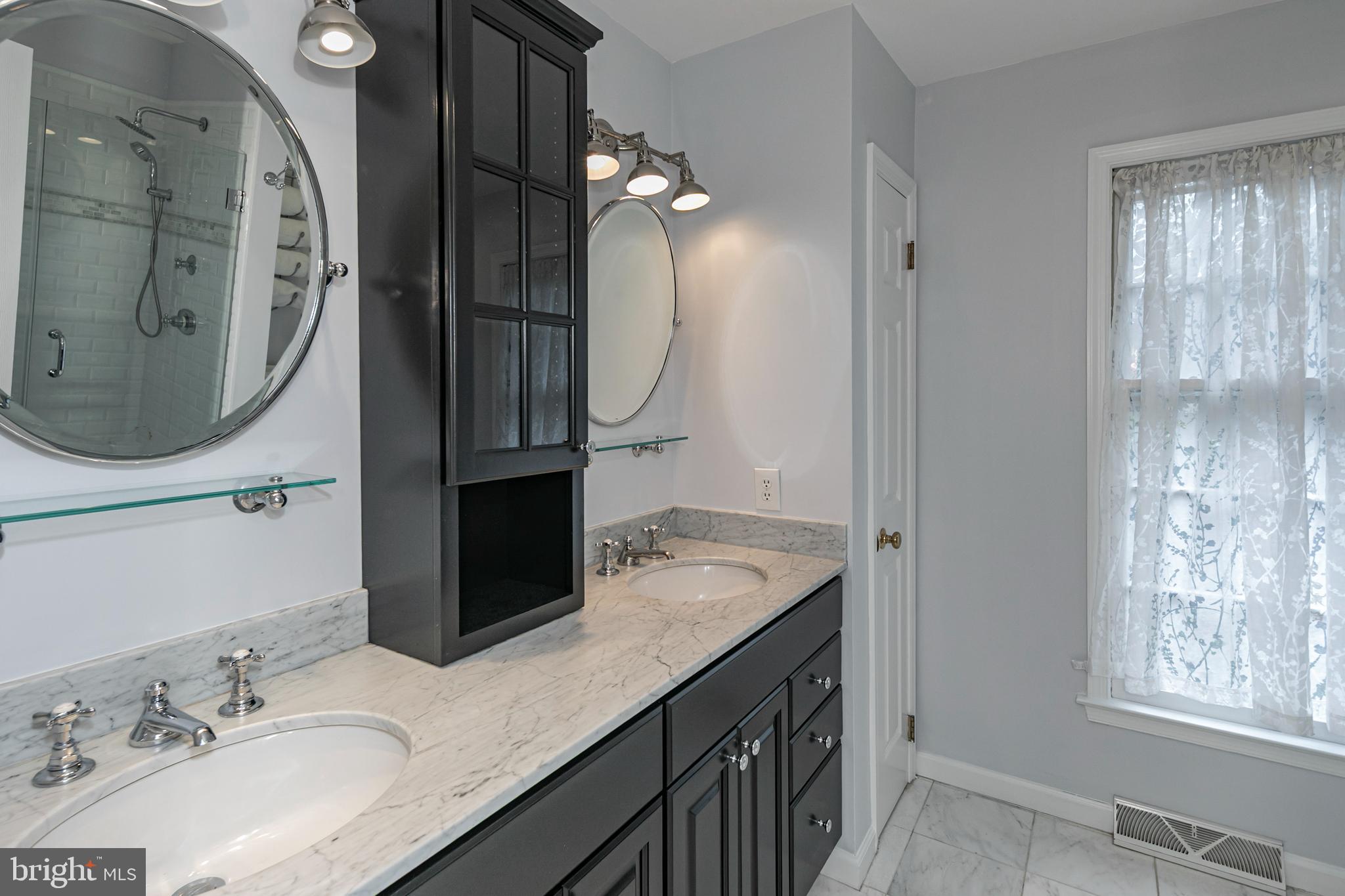 23 Meadow Lane Pennington, NJ 08534 - Photo 32 of 60 a bathroom with a double vanity sink and a mirror