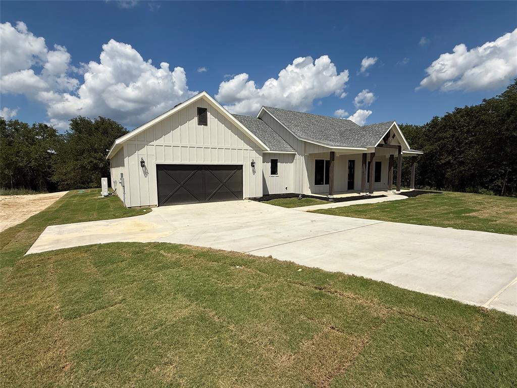 273 Zebrastone Way Poolville, TX 76487 - Photo 1 of 1 a view of a house with a yard