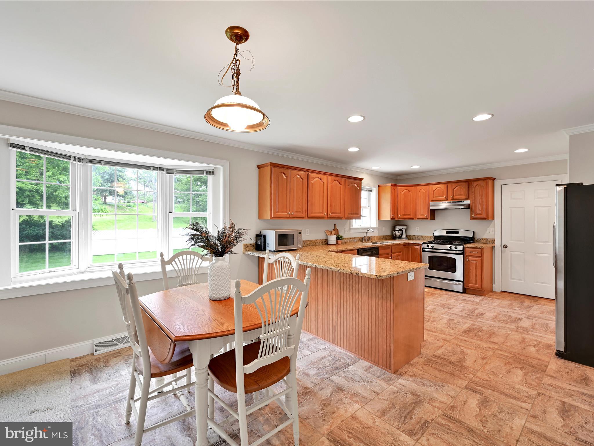 7 West Ridge Road Lititz, PA 17543 - Photo 15 of 40 a view of a dining room with furniture window and outside view