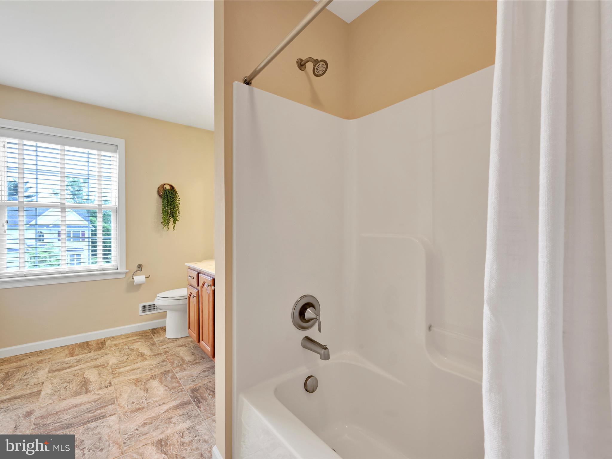 7 West Ridge Road Lititz, PA 17543 - Photo 25 of 40 a bathroom with a bathtub and a shower