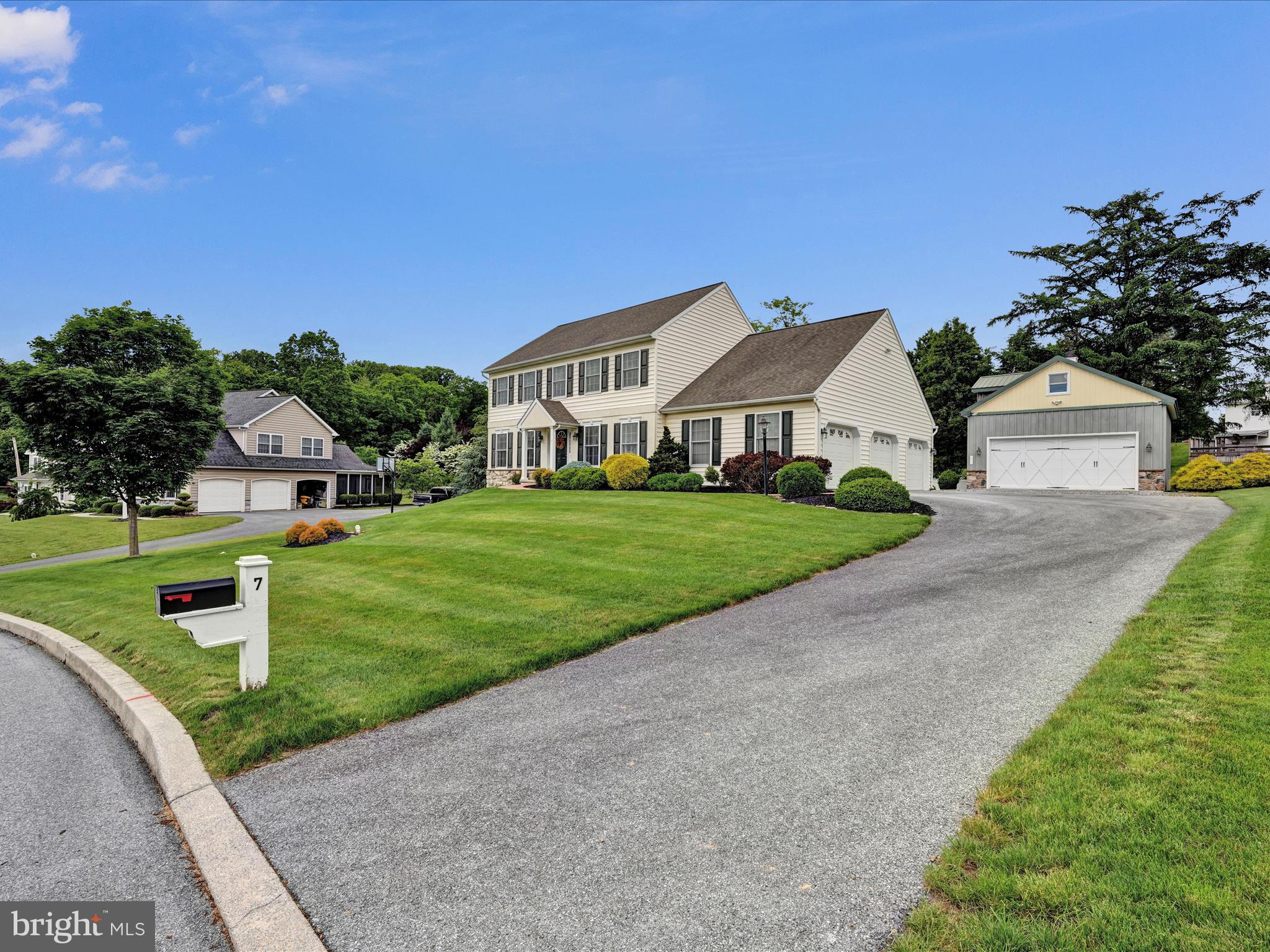 7 West Ridge Road Lititz, PA 17543 - Photo 37 of 40 a front view of a house with a yard