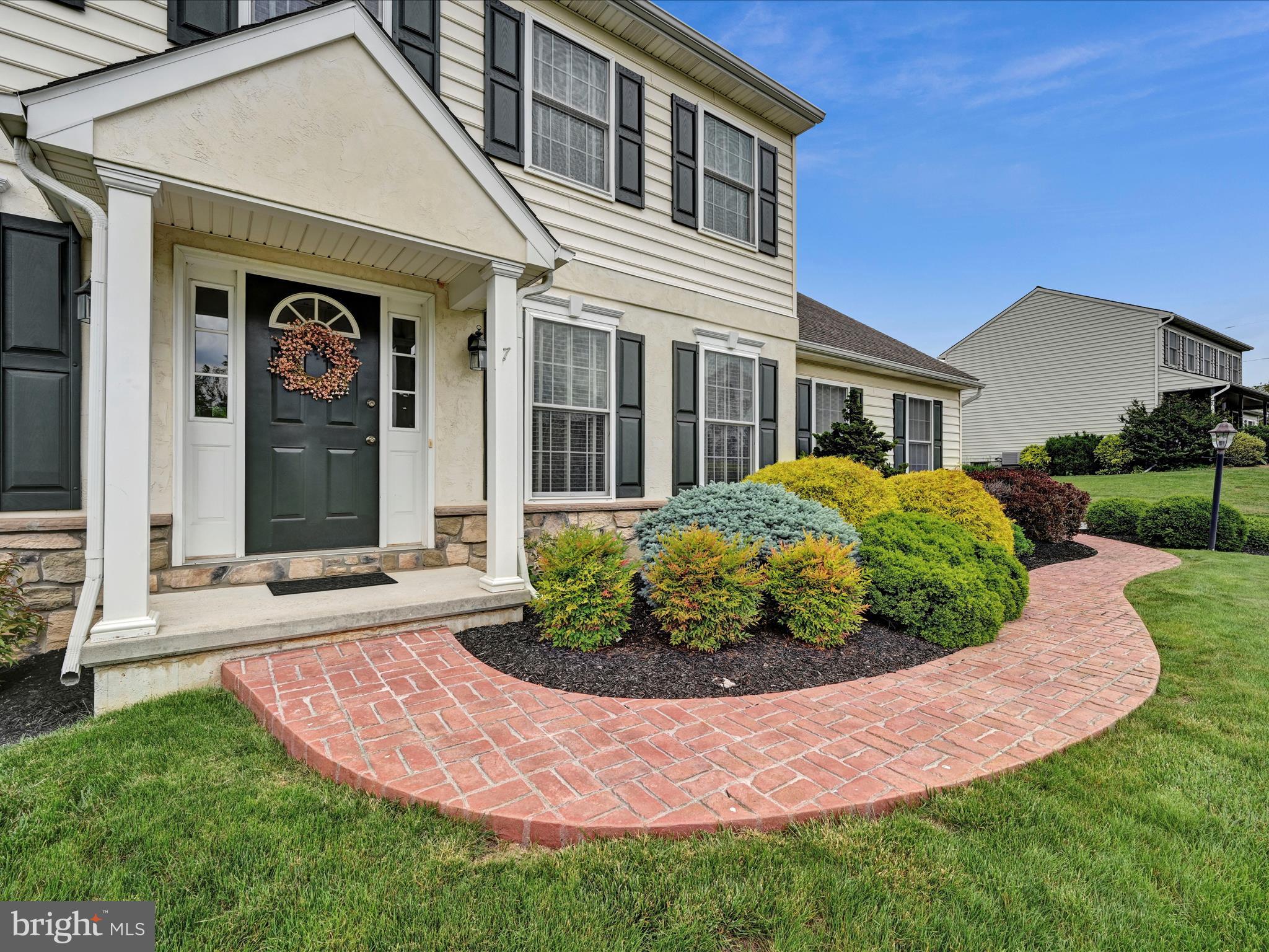 7 West Ridge Road Lititz, PA 17543 - Photo 4 of 40 a front view of a house with a garden