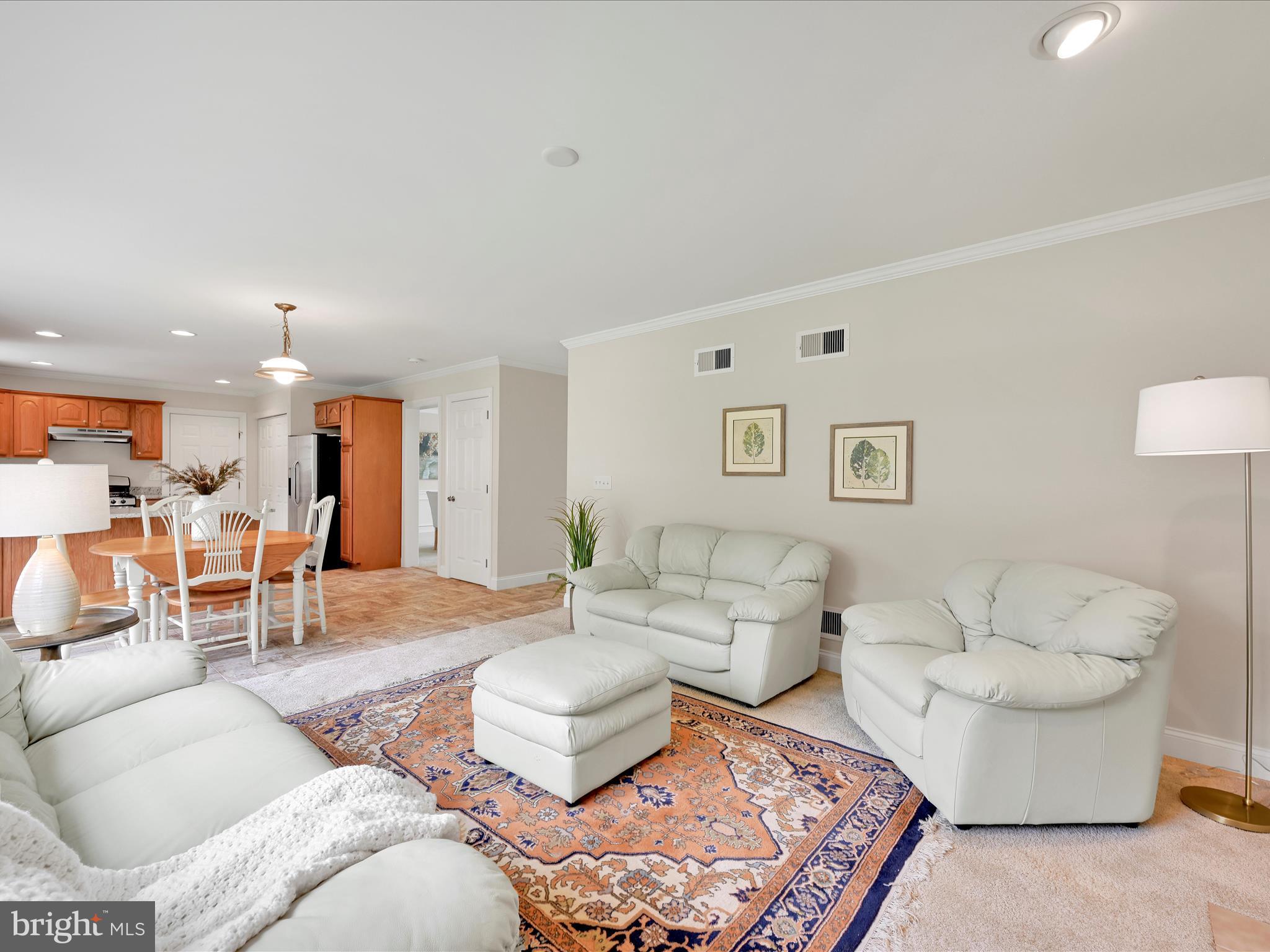 7 West Ridge Road Lititz, PA 17543 - Photo 7 of 40 a living room with furniture and a table