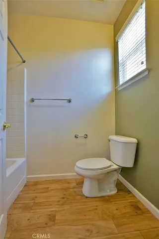 a view of a house with a yard and garage