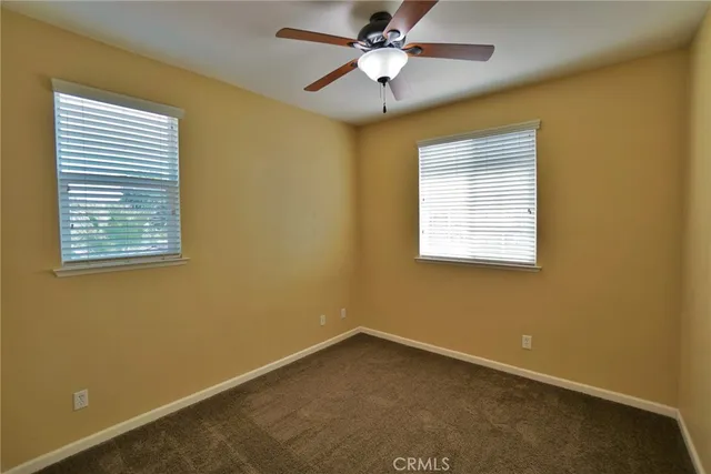 a view of house with swimming pool outdoor seating