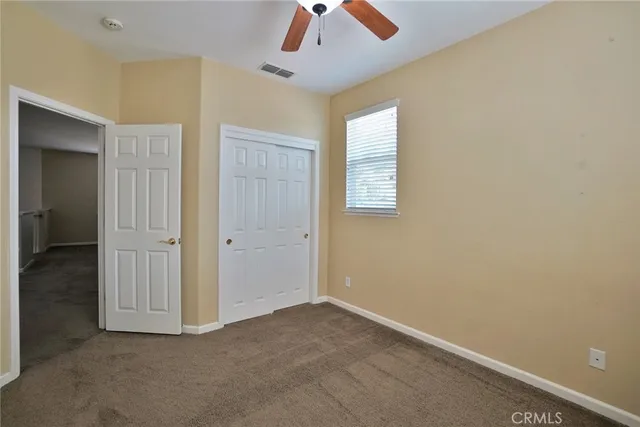 a swimming pool with outdoor seating and yard