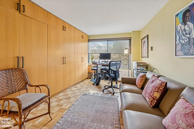 a living room with furniture and a window