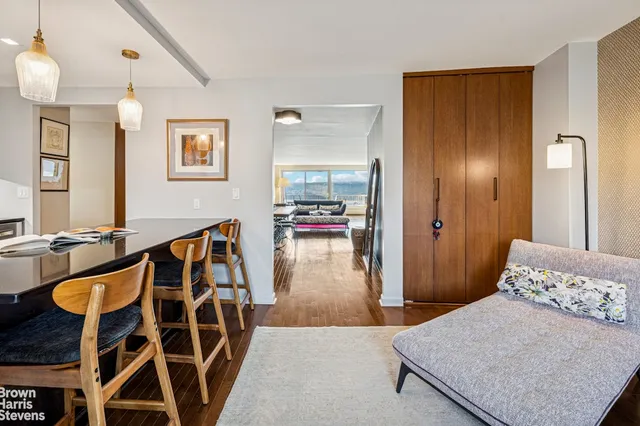 a view of a livingroom with furniture and windows