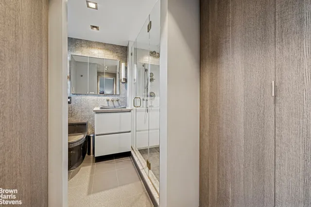 a view of a kitchen from the hallway