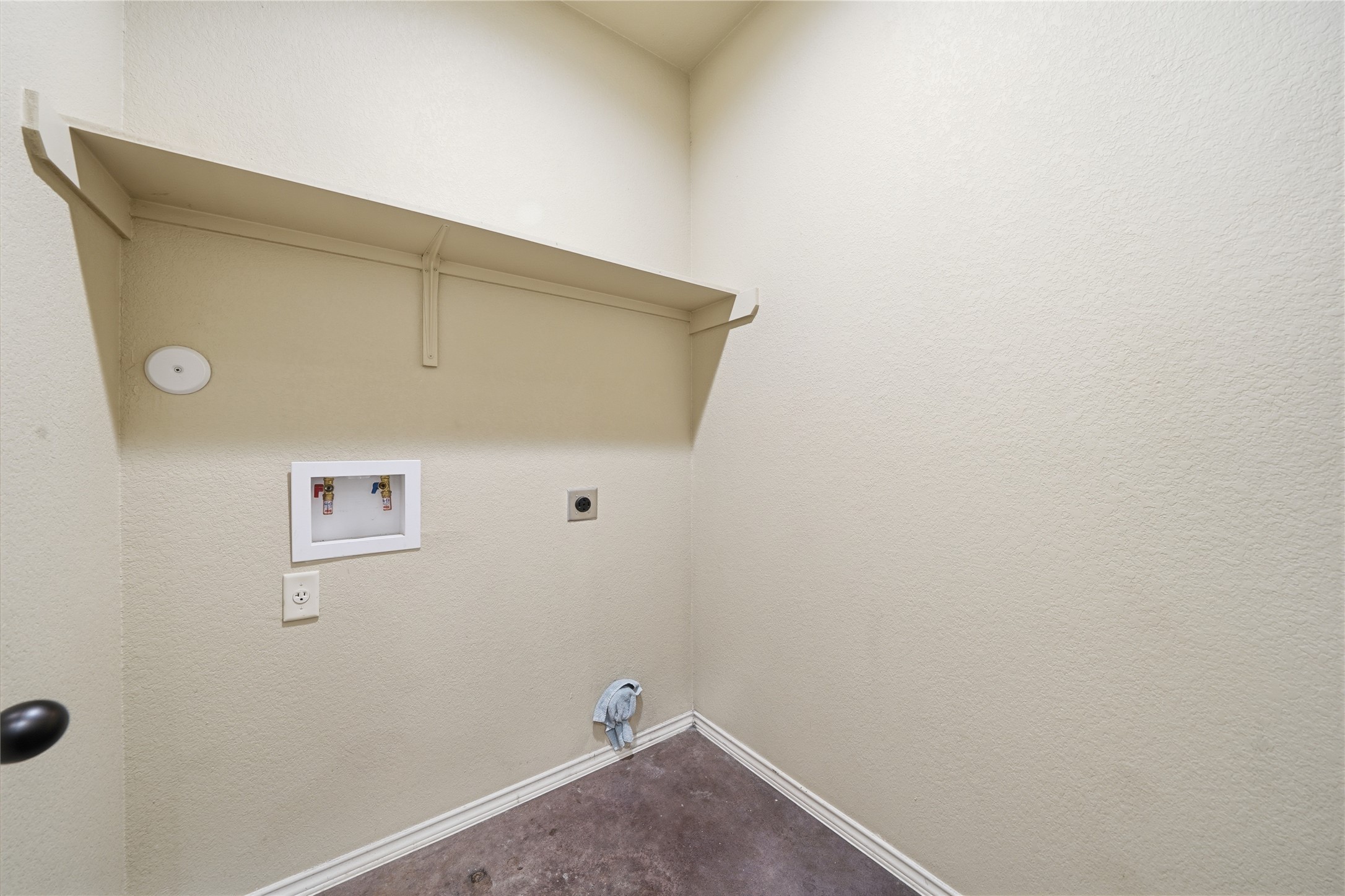 533 Jack Rabbit Lane, Unit A Buda, TX 78610 - Photo 27 of 34 A dedicated laundry closet with convenient hookups and overhead storage.