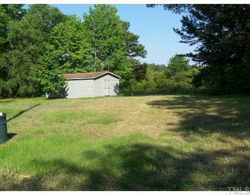 571 Lee Road Clayton, NC 27520 - Photo 2 of 8 Plenty of space in the back yard.