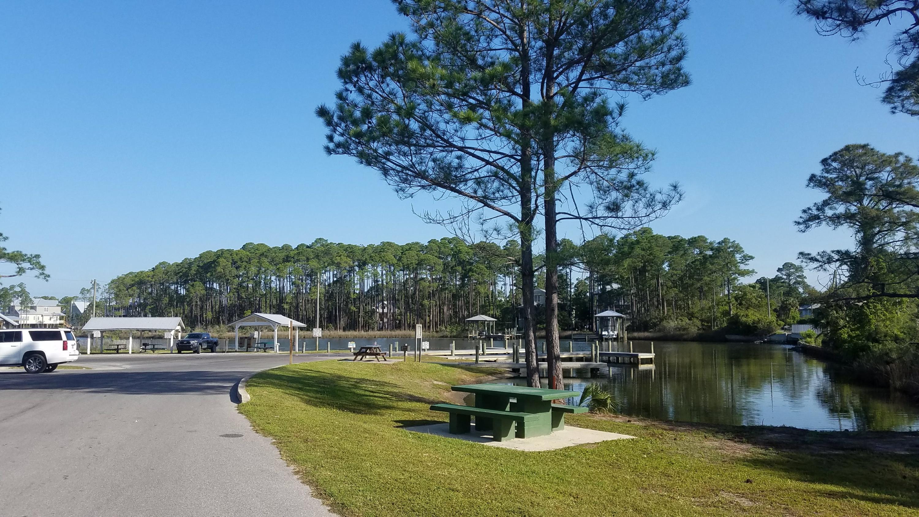 9-10 Central 8th Santa Rosa Beach Santa Rosa Beach, FL 32459 - Photo 5 of 8 a view of a lake with a house