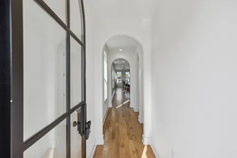 a view of a hallway with a mirror