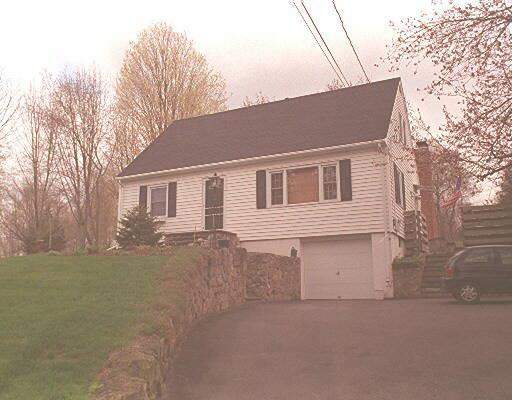 168 Walnut Hill Road Bethel, CT 06801 - Photo 1 of 1 a backyard of a house with large trees