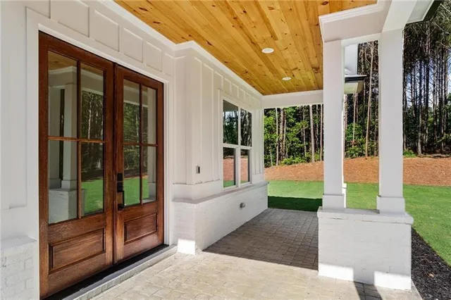 a bathroom with a tub and shower