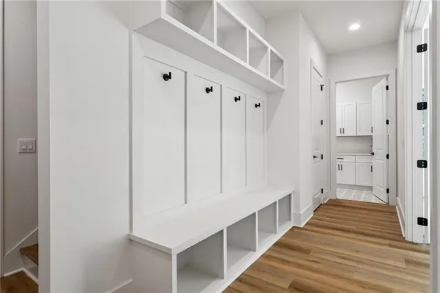 a view of cabinets with wooden floor