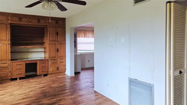 a view of a hallway with a bedroom