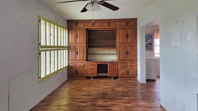 a view of livingroom with furniture and windows