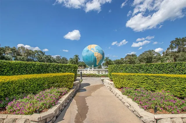 a view of a garden with a fountain