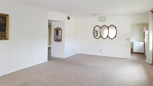a view of a livingroom with wooden floor