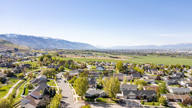 892 East 400 South Smithfield, UT 84335 - Photo 41 of 44 Aerial view of residential area with a mountain backdrop