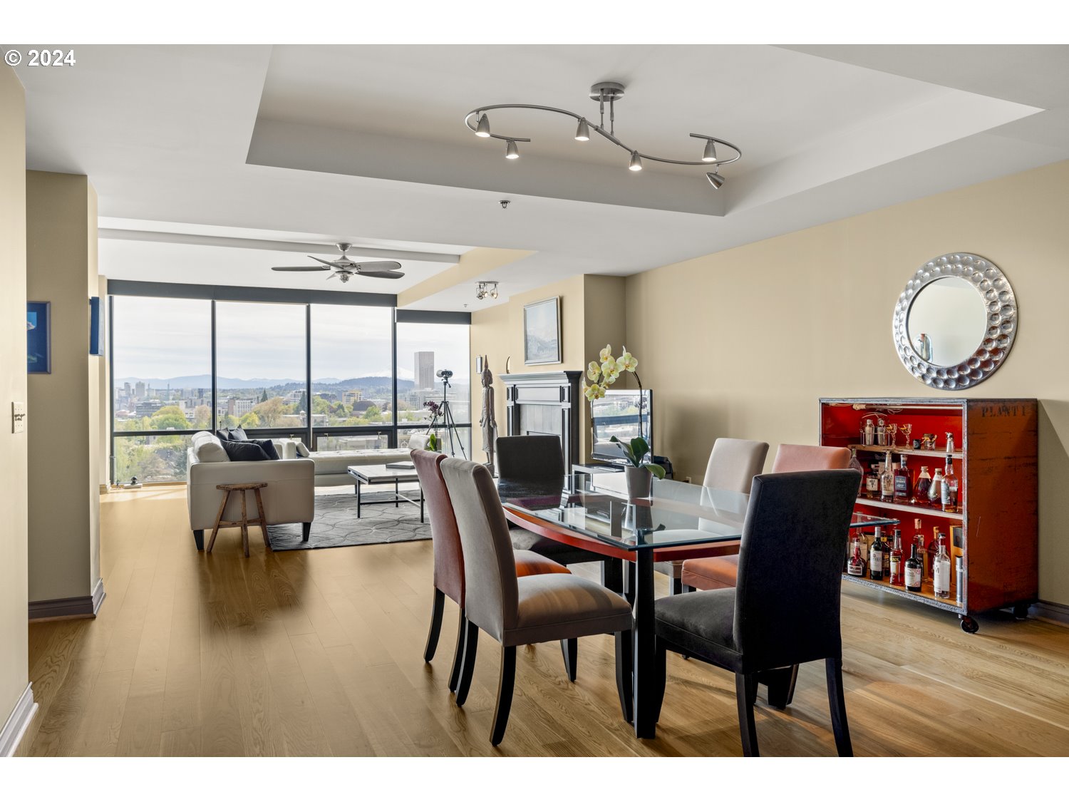 2454 Northwest Westover Road, Unit 405 Portland, OR 97210 - Photo 11 of 37 a view of a dining room with furniture window and wooden floor