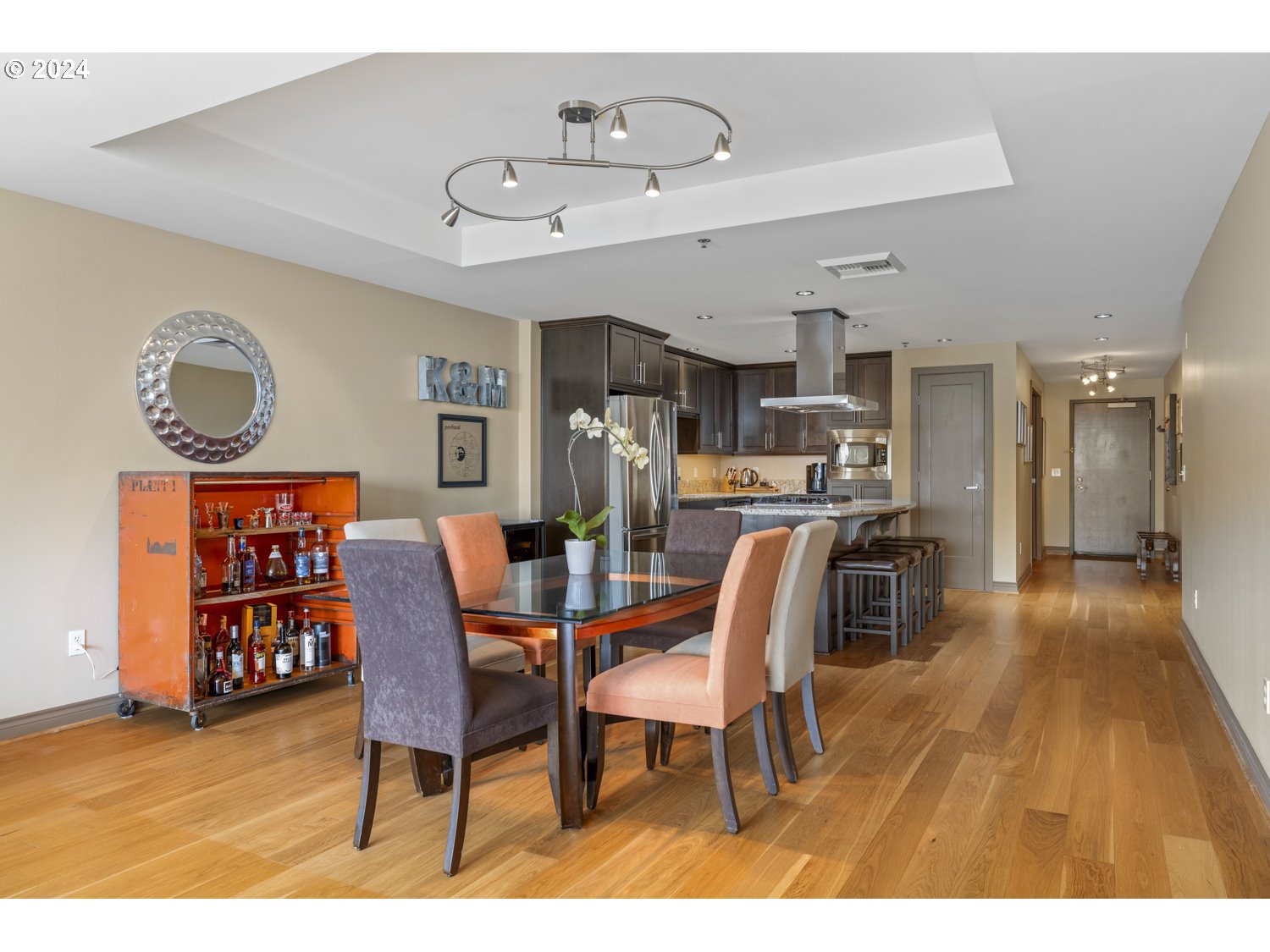 2454 Northwest Westover Road, Unit 405 Portland, OR 97210 - Photo 12 of 37 a dining room with furniture and a kitchen view