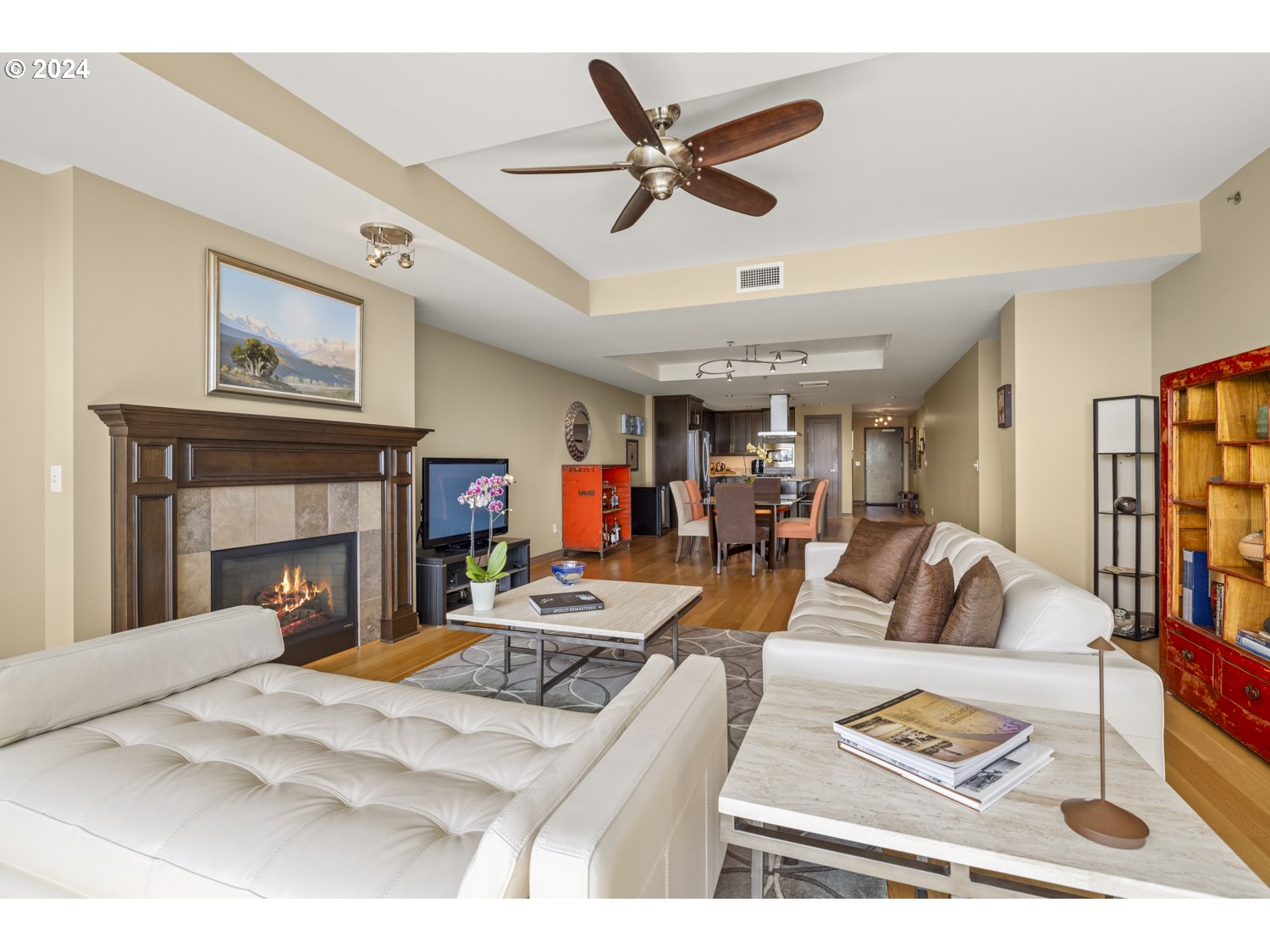 2454 Northwest Westover Road, Unit 405 Portland, OR 97210 - Photo 17 of 37 a living room with furniture a fireplace and a window