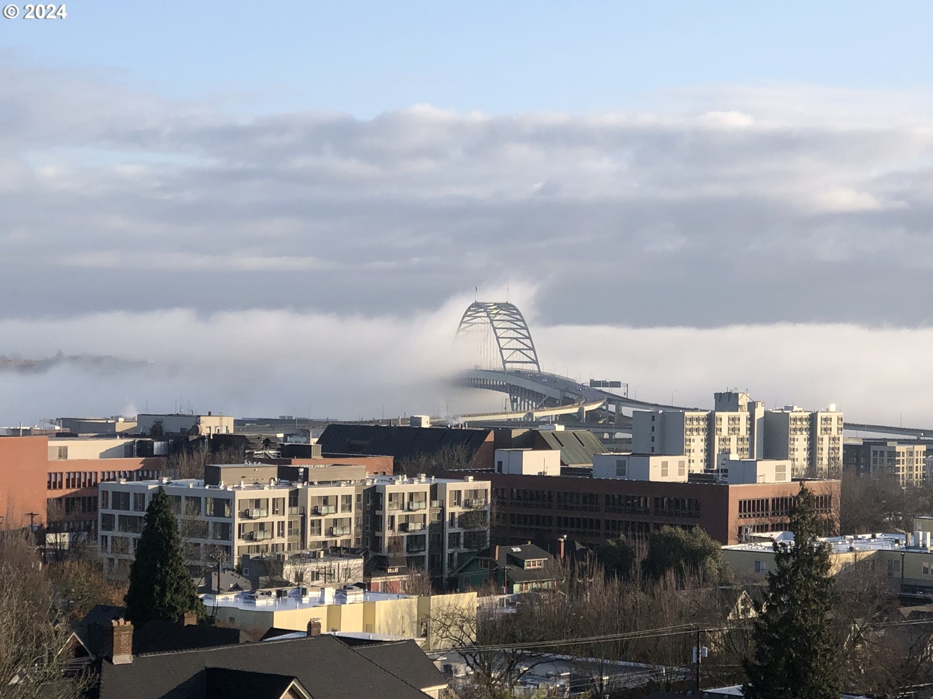 2454 Northwest Westover Road, Unit 405 Portland, OR 97210 - Photo 20 of 37 a view of a city that has tall buildings
