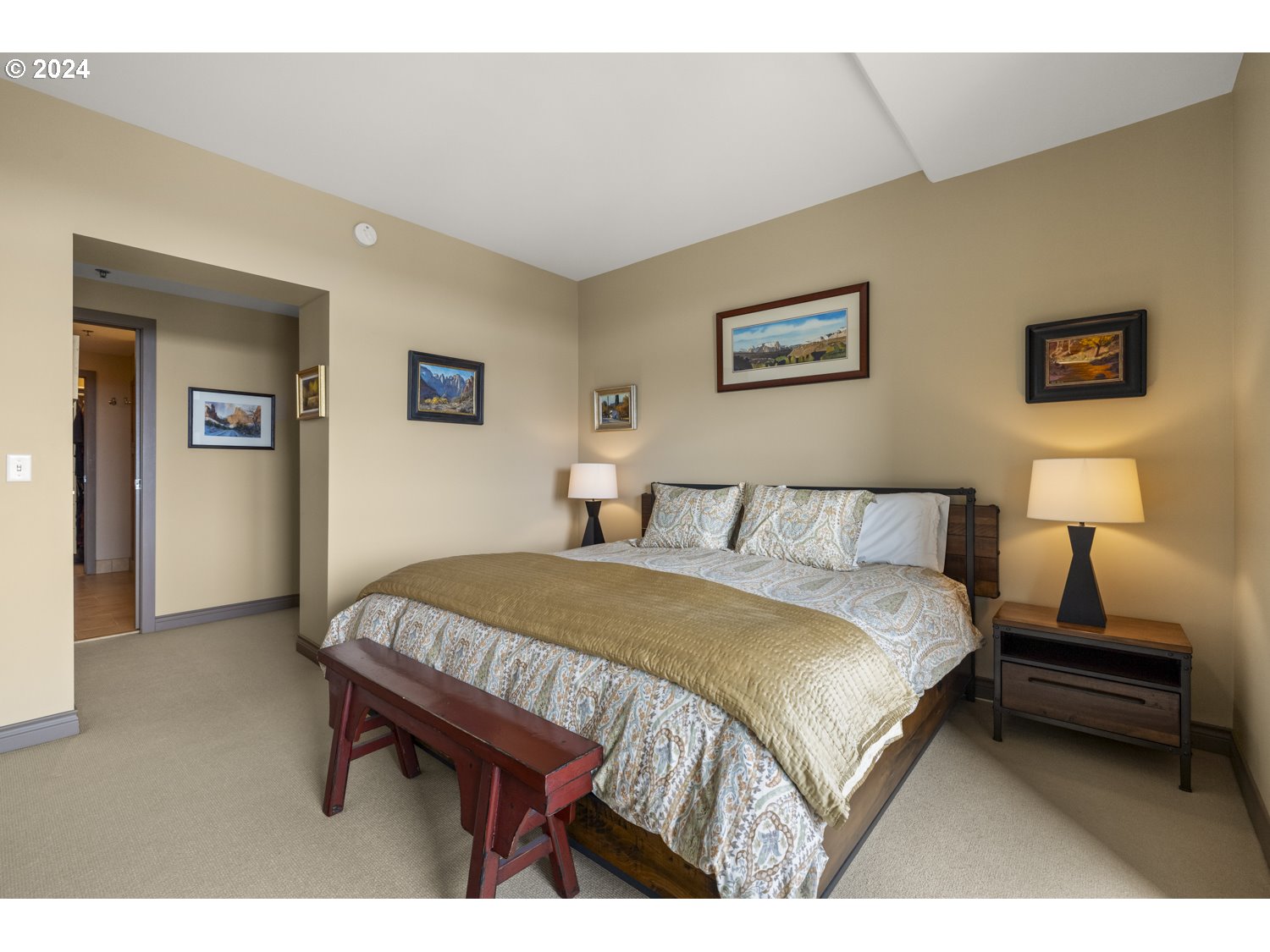 2454 Northwest Westover Road, Unit 405 Portland, OR 97210 - Photo 23 of 37 a bedroom with a bed and a table in it