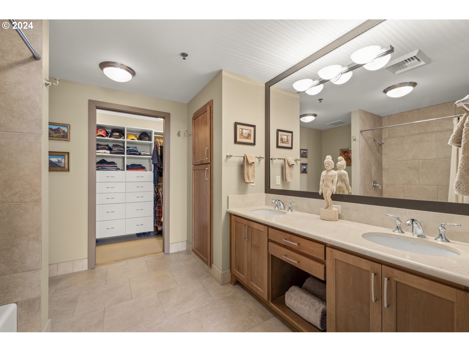 2454 Northwest Westover Road, Unit 405 Portland, OR 97210 - Photo 24 of 37 a bathroom with a granite countertop sink mirror and double
